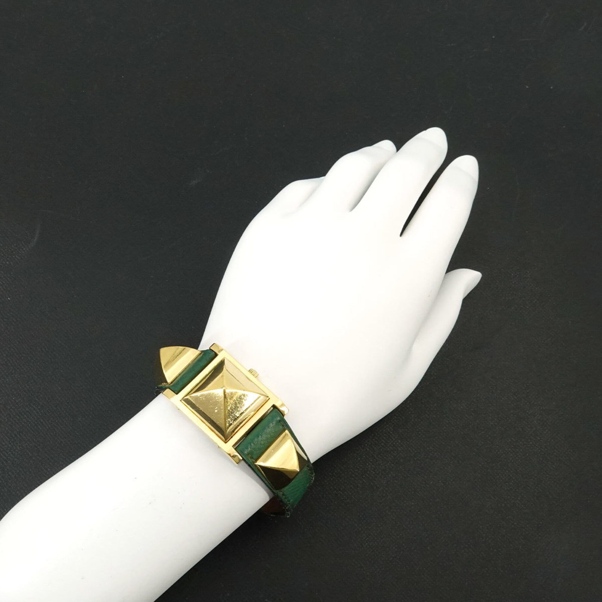 Hermes Medor Women's Watch, Pyramid Design, Gold Studs, White and Green Leather Strap, Quartz Movement.