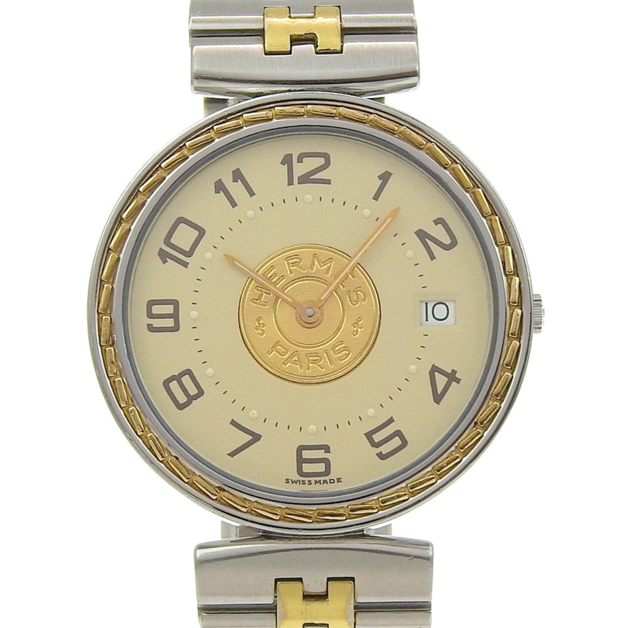 Hermès Serie watch, stainless steel, quartz movement, analog display, ivory dial, unisex