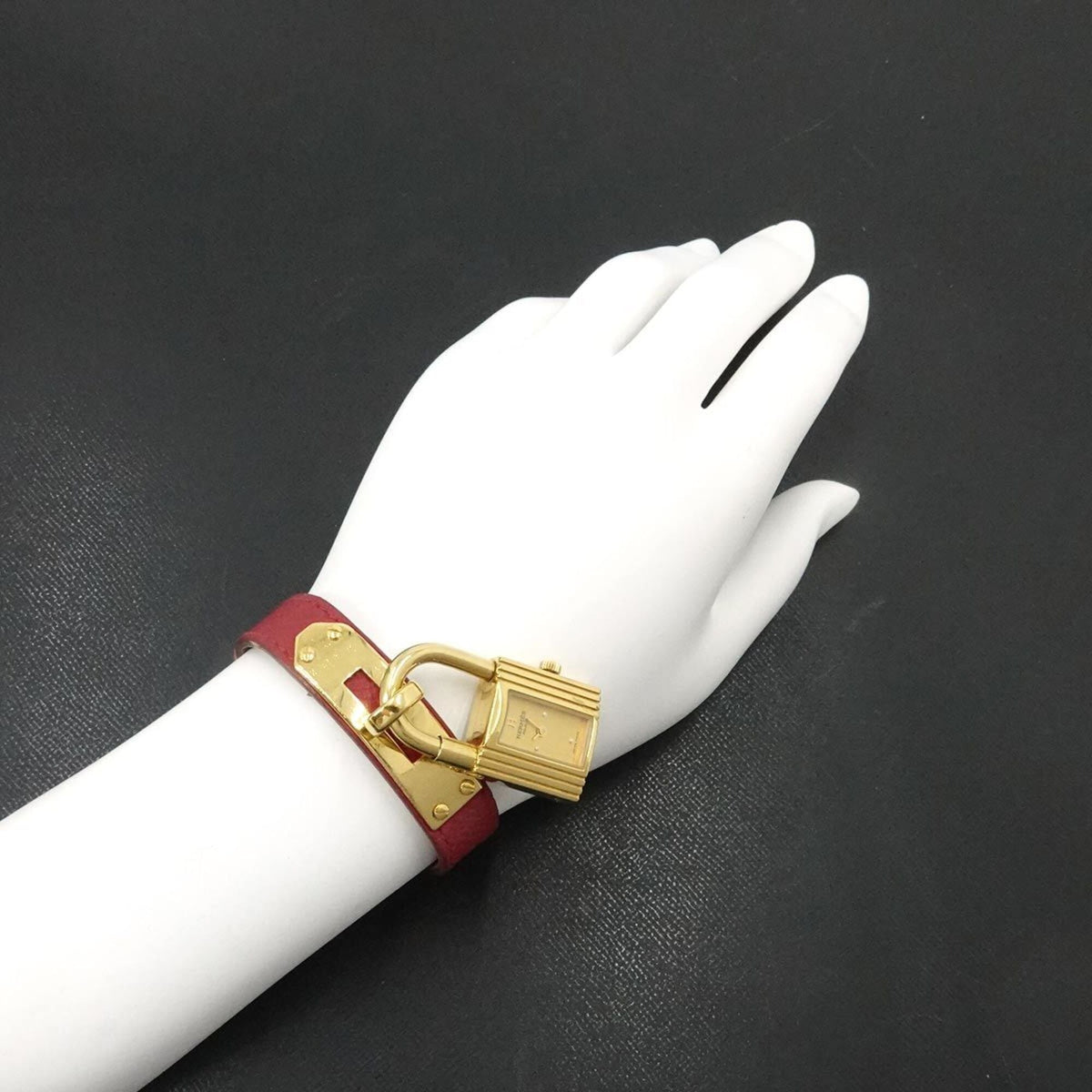 Montre Hermès Kelly à cadran doré, 20 mm