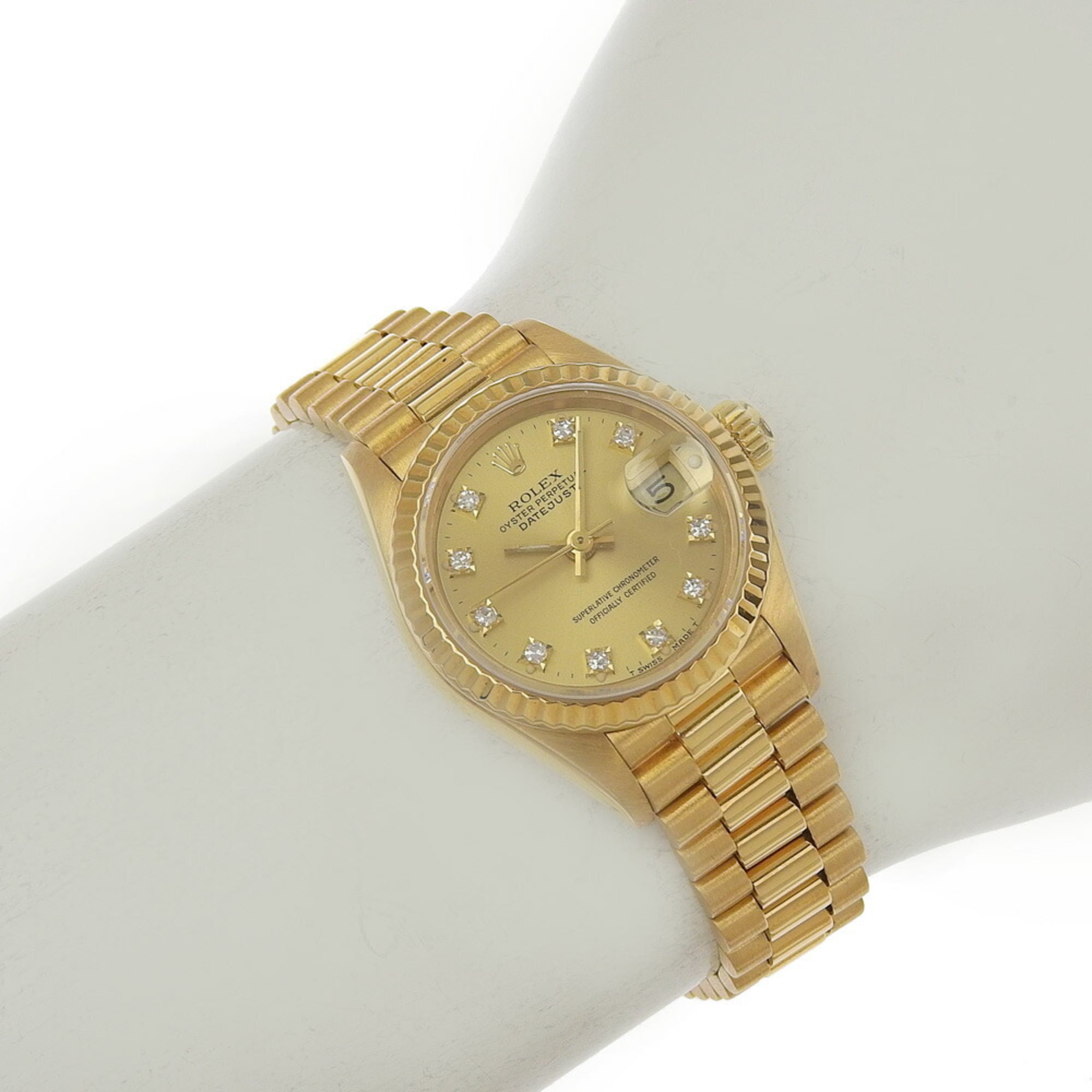 Rolex Datejust 69178G (R serial number, circa 1987-88), gold dial, 10 diamond accents, 18K yellow gold, 72.2g, automatic movement, 26mm wristwatch.