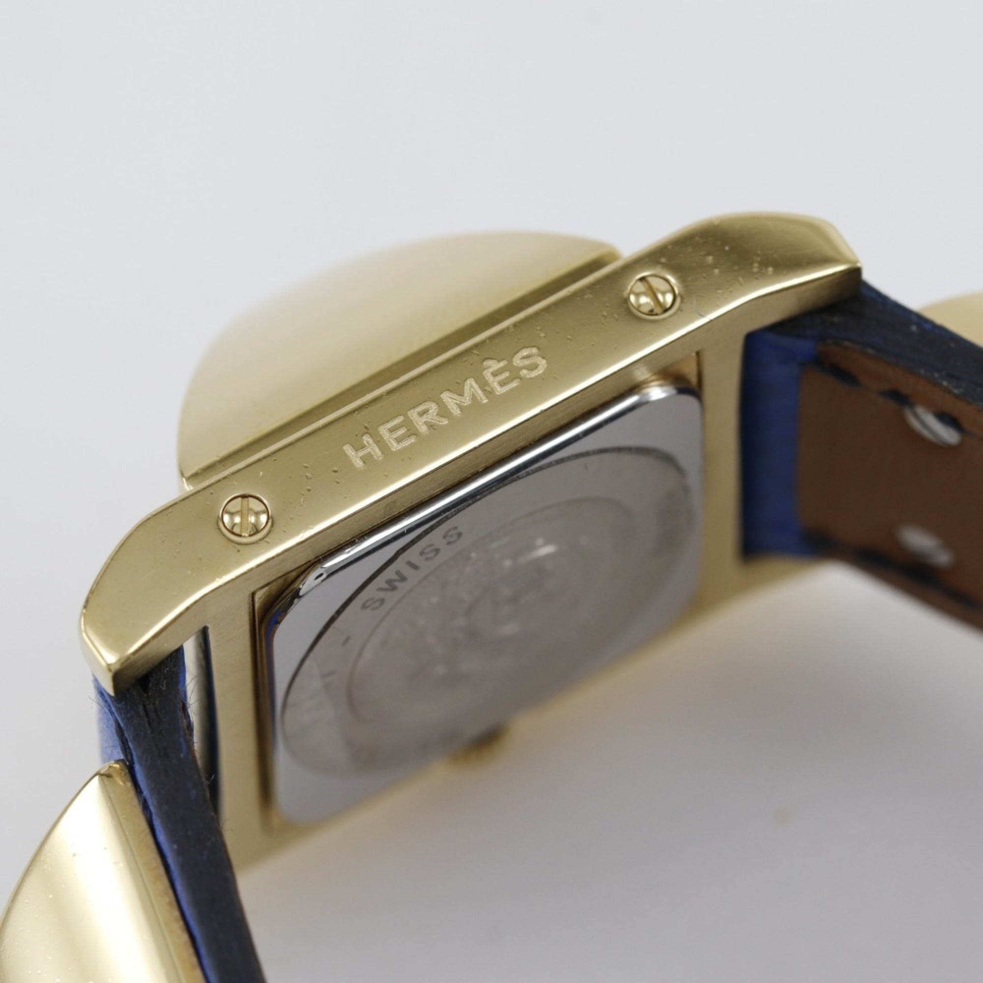 Hermes HERMES Medor-horloge, verguld x leer met reliëf, 1994, kwarts, analoog display, witte wijzerplaat, dames