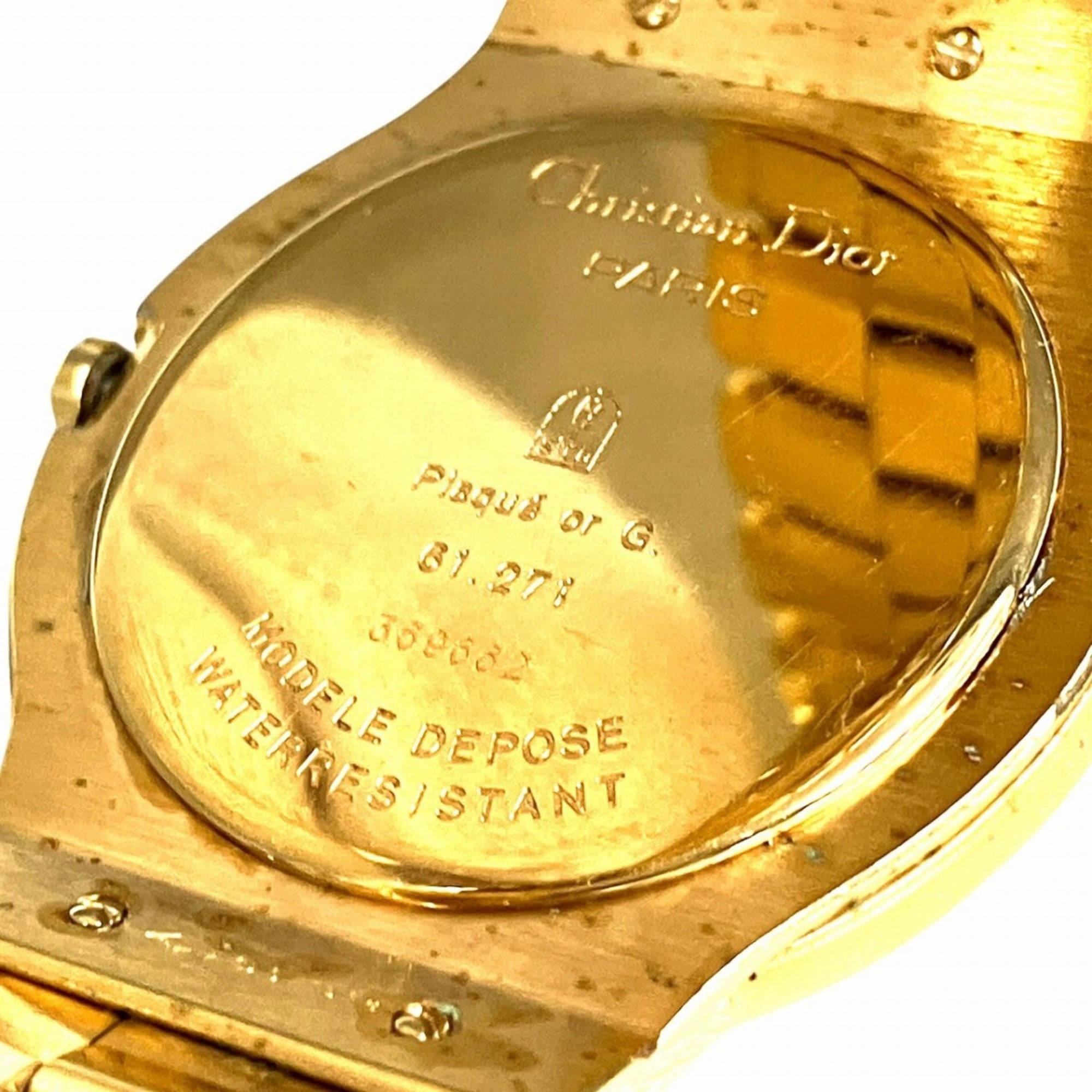 Montre Christian Dior Phase De La Lune et triple calendrier, poids total : 70,6 g, finition plaquée or (GP), mouvement Quartz, cadran Blanc, référence 61.271
