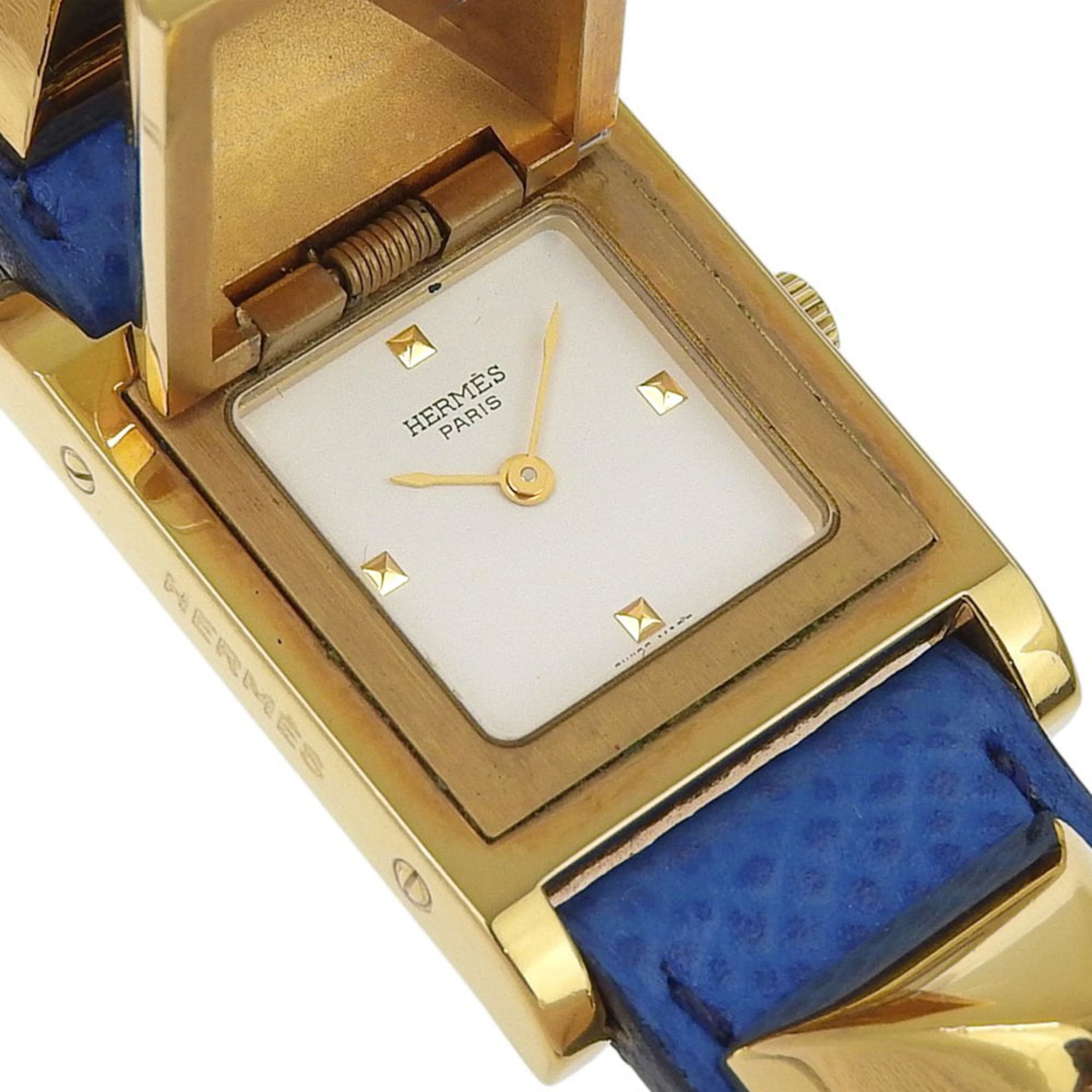 Montre Hermès Medor, plaquée or et cuir, modèle 1994, Quartz, analogique, cadran Blanc, pour femme.