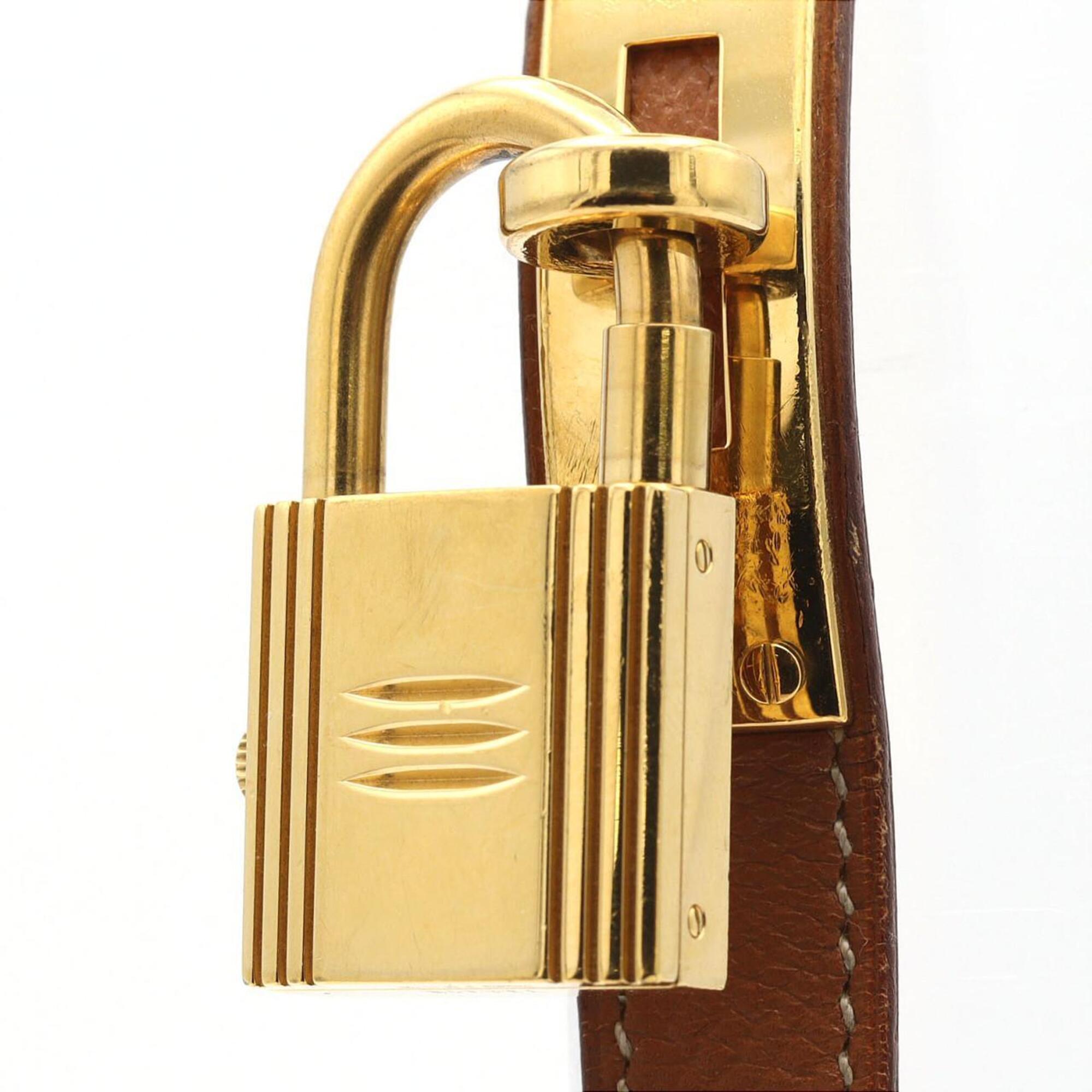 Montre Hermès Kelly à cadran doré, 20 mm