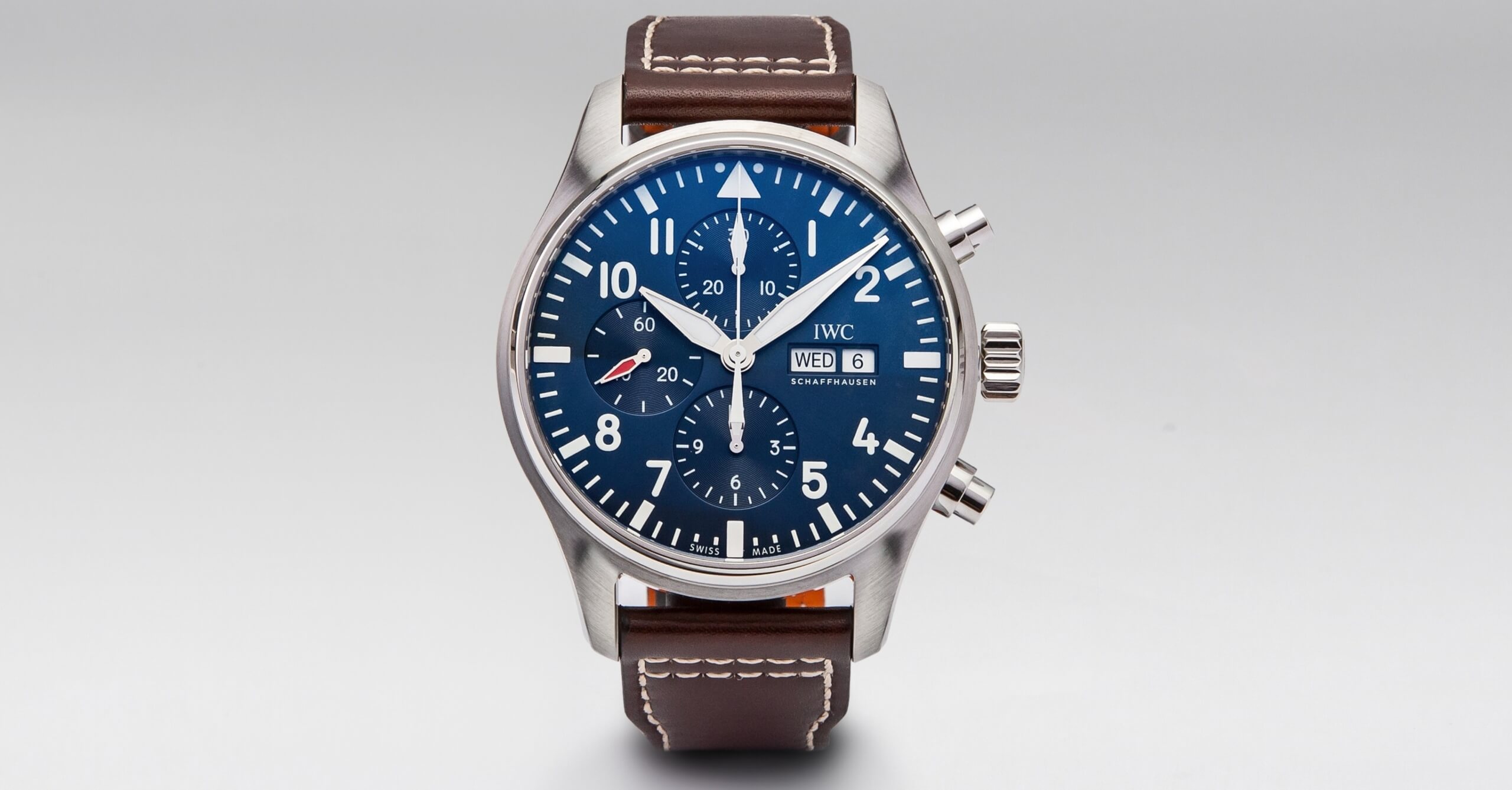 IWC Pilot's timepiece, with a blue dial and day/date complication.